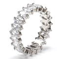 Detailed view of silver eternity ring with oval cut cubic zirconia and prong setting - Steel Color + White Zirconia / US 10