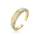 Detalle del anillo dorado 18K con esmalte azul claro e incrustaciones de circonitas - Abierto Ajustable / Azul (12180)