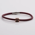 Detail of burgundy leather bracelet with rose gold zircon bead and magnetic clasp - Dark Wine Red