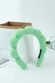 Green plush sponge headband with twisted bubble texture and hand-made woven label - Light Green