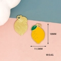Detailed view of yellow enamel lemon pendants with dimensions 18mm by 11.5mm - Lemon (10)