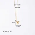 Detailed view of gold letter V pendant with 40cm chain and size measurements - Letter V