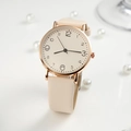 Women's quartz watch with rose gold case, cream dial and beige leather strap on white surface - Beige