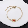 Vintage gold stainless steel chain bracelet featuring an oval red turquoise stone inlay - Dark Red Imitation Stone