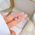 Sparkling silver reindeer horn stud earrings with round zircons on a light background - Zircon Elk Antler Style (A114)