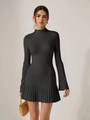 Detail view of the fine pleated skirt and slim fit flared long sleeves of the black dress - Dark Gray