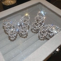 Elegant silver butterfly hoop earrings with sparkling cubic zirconia on a velvet display - Silver Butterfly Full Rhinestone Earrings (Silver Earring Post) (53#)
