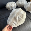 Detail view of the breathable linen blend fabric and plaid pattern on this retro flat cap - Forward Hat (Wide Plaid)