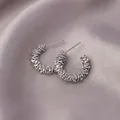 Silver-colored C-shaped geometric hoop earrings with textured metallic surface finish - E-051---Platinum