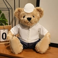 Cute brown teddy bear plush toy wearing a white baseball cap and denim pants outfit - White Zirconia Set / 28cm