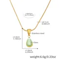 Detail view of waterdrop glass pendant necklace with dimensions 3.0x1.0cm and 40+5cm chain - 40+5cm / Gold with Green Glass Stone