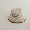 Detailed close-up of beige corduroy kids bucket hat with letter print and embroidery - 52cm (2-5 Years) / Beige