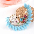 Golden peacock brooch with blue cat eye stone and multicolor rhinestones - Blue Cat's Eye Peacock Style