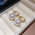 Close-up of elegant French vintage gold hoop earrings with large round white pearls - Gold Smooth Style
