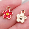 Red flower pendant and gold textured metal charm for DIY jewelry held in hand - Red Daisy (12252)