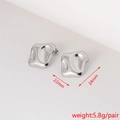 Macro detail of silver star-shaped earrings showing 22mm 24mm sizes and 5.8g weight - Irregular Wave Round (18#)