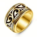 Detailed view of vintage gold titanium ring with intricate black totem patterns - US 7 / Gold