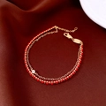 Detail of 18k gold plated double layer bracelet with red beads and zircon stone - Double Layer Zirconia Red String Style / Gold-Red (Real Gold Plated)