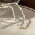 Elegant 2mm white crystal pearl necklace featuring high luster and vintage French style - 4mm White