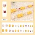 Close-up of R691 press-on nails set with strawberry and poached egg patterns - R691 Cute Childhood