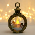 Christmas LED lantern featuring a snowman and winter cabin scene with bronze finish - Snowman / Antique Gold