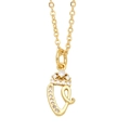 Macro detail of gold lowercase initial necklace with sparkling crystal rhinestones - Letter V