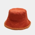 Detail of rust orange corduroy bucket hat with thick faux shearling brim trim - M (56-58cm) / Orange