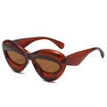 Fashionable oversized amber cat-eye sunglasses with translucent frames and brown lenses - Tea Frame Tea Lens