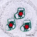 Trois petites chaussettes de Noël en feutre de laine vert avec des étoiles rouges - Chaussette Étoile-Verte / Ensemble de 3