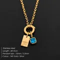 Collar de acero inoxidable chapado en oro 14K con colgante de letra W y cristal azul - Letra W