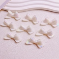 Luminous pearlescent 3D bow charms for DIY phone chains and keychains in white finish - 20x46mm/Aperture Approx 2.5mm / Luminous Iridescent White
