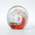 Artistic crystal glass ball paperweight with red spiral pattern and ocean bubble interior - 80mm Ocean Wave Bubble Ball - Orange Red