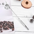 Silver stainless steel candle snuffer with knurled non-slip handle on white wood table - Silver Candle Snuffer Bell