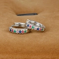 Macro shot of 18K gold plated huggie earrings featuring vibrant multi-color gemstones - 8mm Hoop / Silver Colorful Zirconia