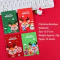 Mini kerst notitieboekje met rendier ontwerp op een feestelijke rode achtergrond - Kersthert