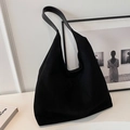 Minimalist large black canvas tote bag with wide shoulder strap in hobo style - Black