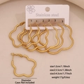 Three pairs of golden stainless steel hexagonal hoop earrings in multiple sizes - Wavy Flower (7# Flower)