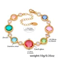 Detail view of colorful Czech glass and zircon stones on a golden stainless steel bracelet - Gold Multicolor