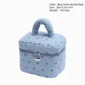Blue corduroy makeup bag with black heart pattern and heart-shaped metal zipper - Barrel Bag / Blue