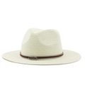 Detail of woven straw fedora hat featuring a brown ethnic ribbon and metal buckle - Creamy White