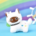 Close-up of white plush cat keychain with studded collar and embroidered hearts. - Lying Style / 12cm / White