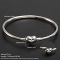 Silver stainless steel heart clasp bracelet with 7.5 inch chain and dimensions display - Polished Heart Side Draw Bangle