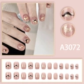 Short square press-on nails with nude pink base, black wave lines and gold foil accents - Nude Pink Black Lines Gold Foil Glue Style (A3072)