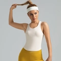 Eng anliegendes cremefarbenes Yoga-Tanktop mit festen Körbchen und Rundhalsausschnitt - S / Elfenbein