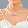 Colorful heart-shaped beaded necklace with translucent macaron resin beads on model - Colorful Macaron Heart Beaded Necklace