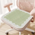 Green Dornier seat cushion with wave trim and Everything All Right text on a pink chair - Fresh Green