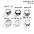 Set di 6 anelli gotici vintage a forma di teschio da uomo con motivi a croce e piume - Stile Argento