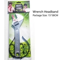 Macro view of Halloween zombie headband wrench prop with bloody effects and forged steel text - Wrench Through Head