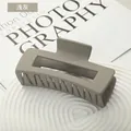 Large matte light grey square hair claw clip for thick hair displayed on a tray - Light Grey