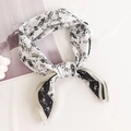 Black and white floral silk scarf tied in a bow on a flat lay minimalist background - 65*65cm / Black Grey Landscape